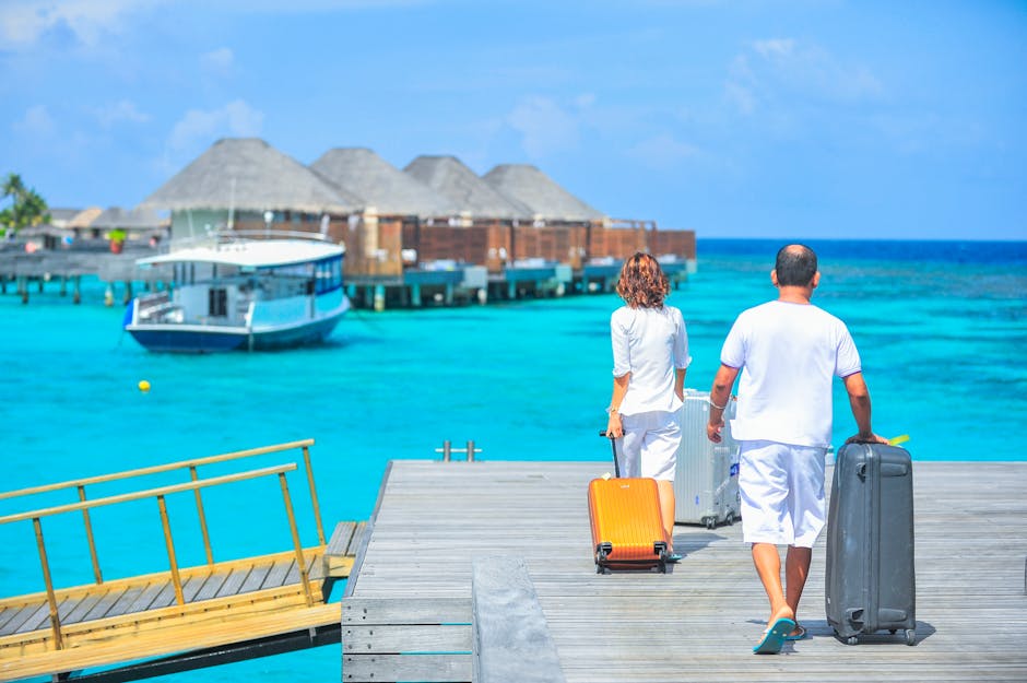 A couple arriving at a luxurious Maldives resort dock with luggage, capturing a tropical vacation vibe